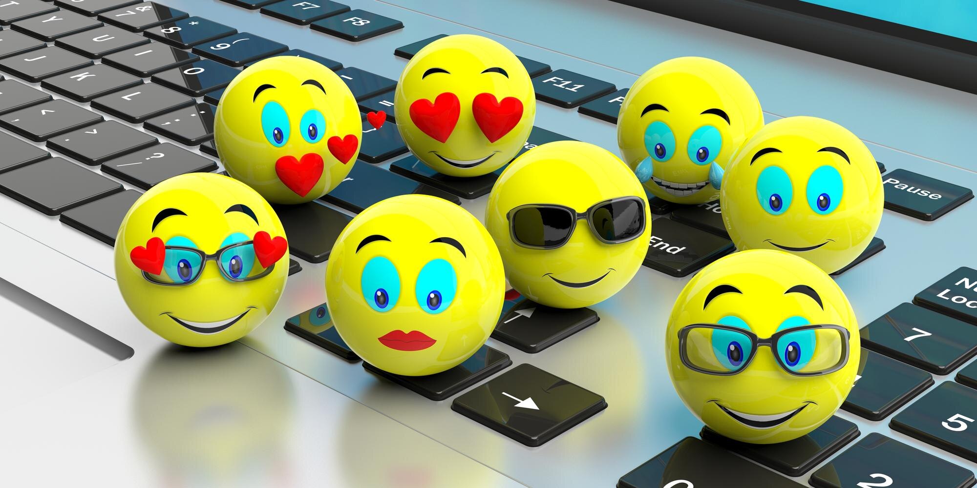 Grupa żółtych emoji na ilustracji 3d laptopa