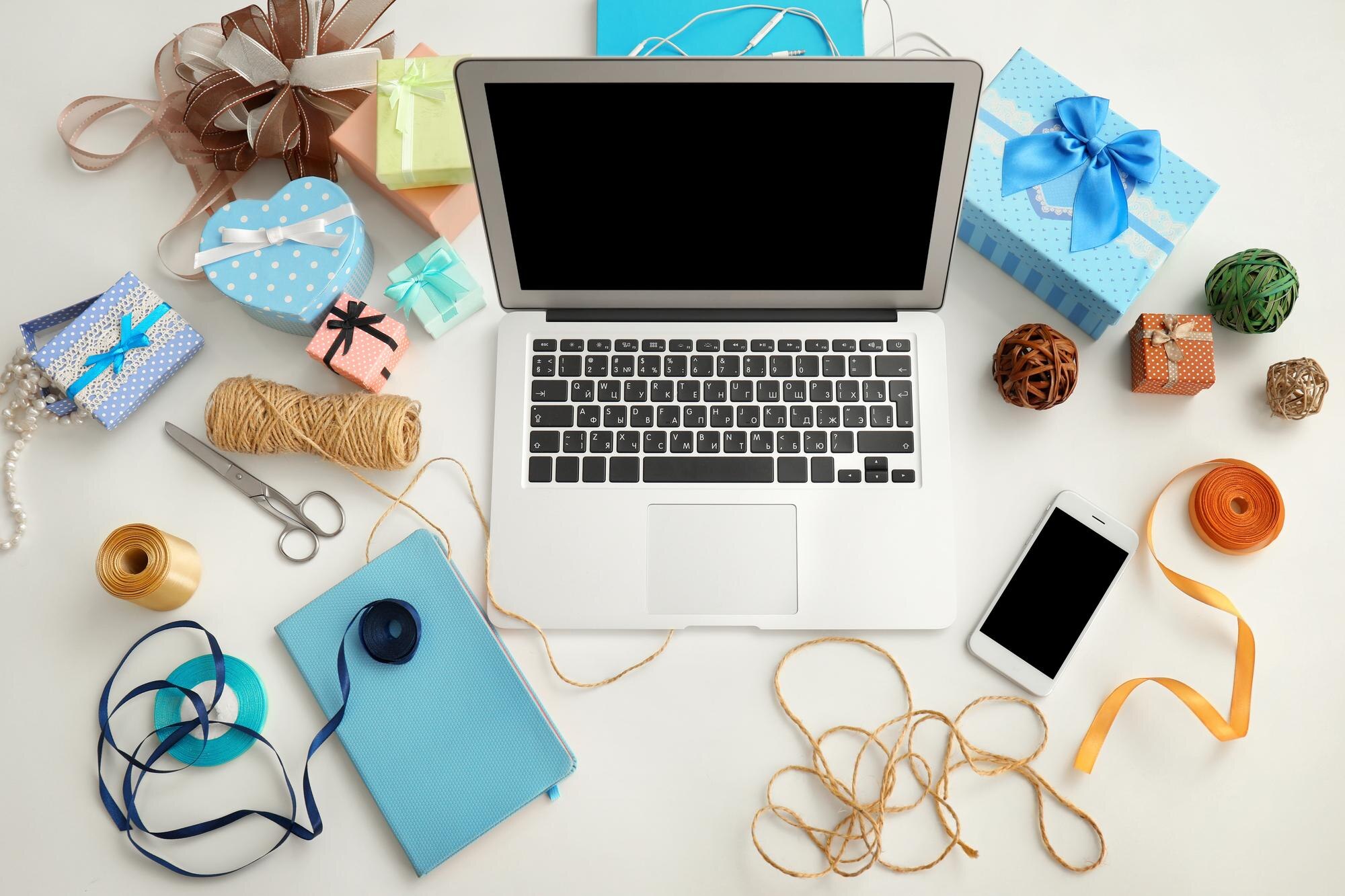 Comfortable bloggers workplace with modern laptop on table